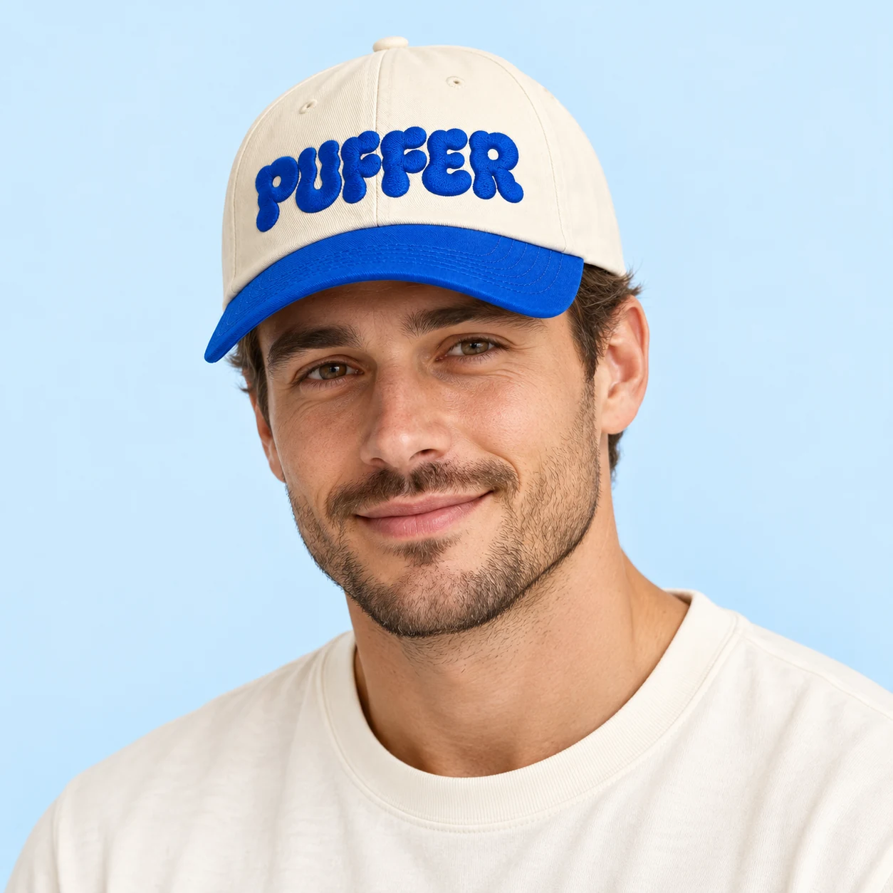 Everyday Cap — On model — Cream / Cobalt embroidery — digital mockup